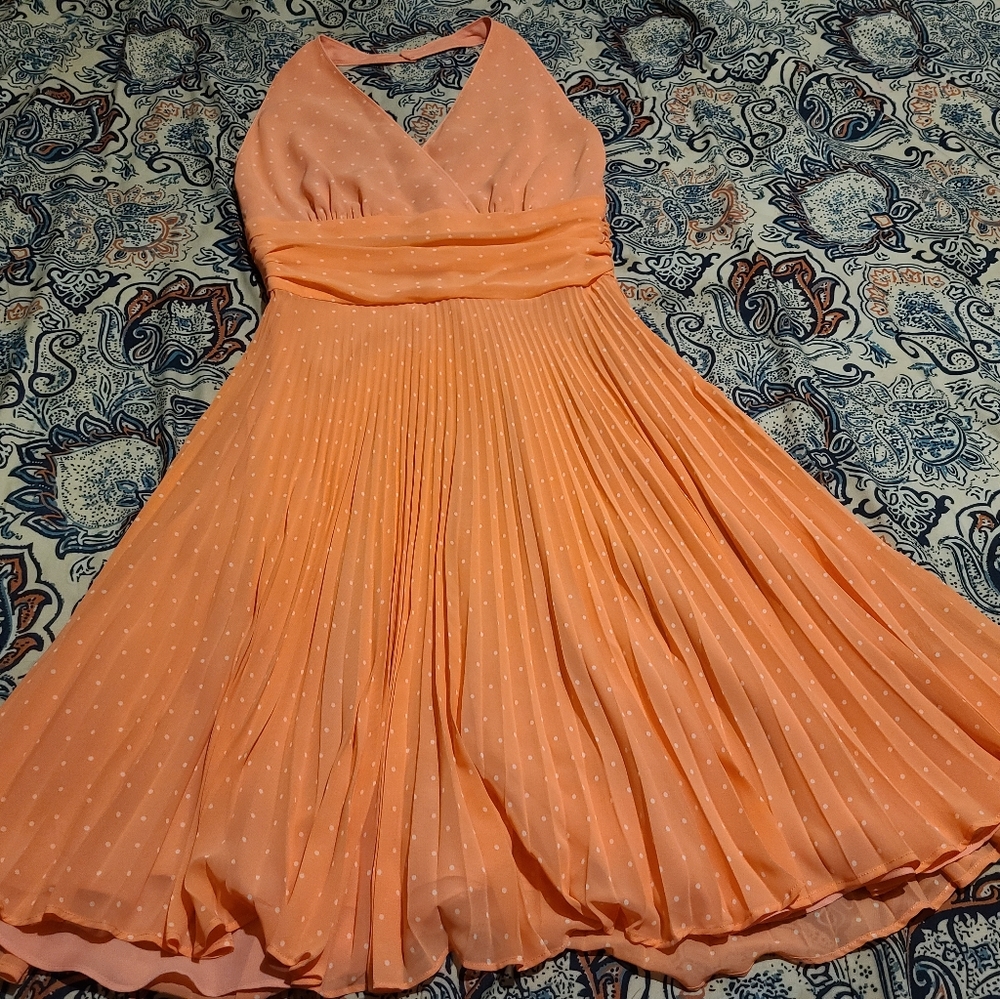Coral w/ small white polka dots, Halter dress with small pleating.